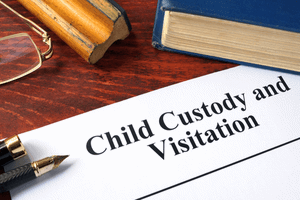paper that reads child custody and visitation