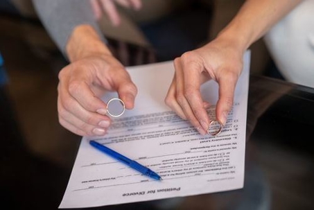 Wedding rings on paperwork